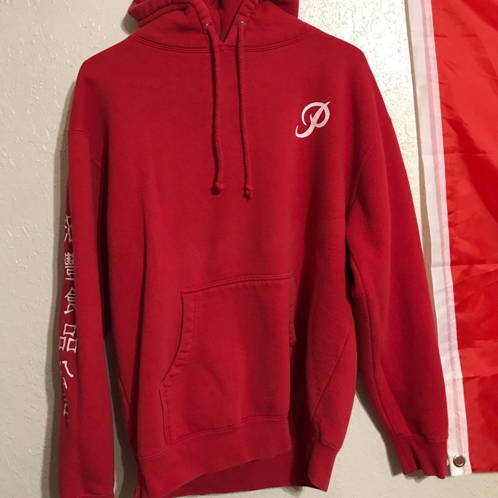 red “primitive” hoodie